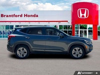 Navigate urban streets and weekend adventures effortlessly in this well-equipped 2024 Kia Seltos EX.... (image 6)