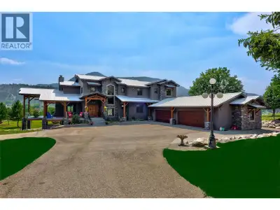 A luxury architect-designed and timberframe-built absolutely stunning riverfront estate with ~500' o...