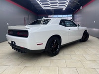 Experience the thrill of driving the 2020 Dodge Challenger SXT in stunning White. This RWD coupe bri... (image 6)