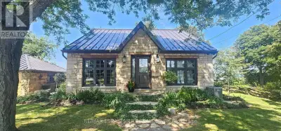 Perched atop the Niagara Escarpment on prestigious Ridge Road, this extraordinary 1848 stone home fe...
