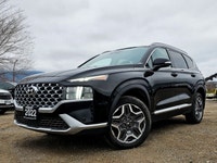 The 2022 Hyundai Santa Fe Hybrid Preferred in sleek Black with an AWD drivetrain offers balanced han... (image 6)