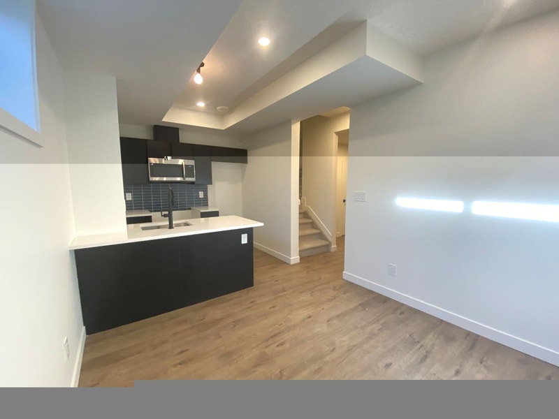 Brand New 3Plex Minutes From Downtown and With In Suite Laundry! | Long ...