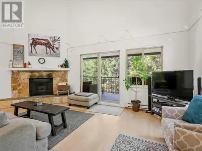 Welcome to #26 Whistler West! This top floor, 1850 square ft end unit consists of 4 bedroom plus a l...