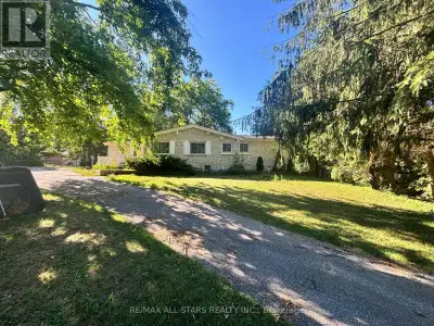 Gorgeous 3-Bed, 3-Bath Bungalow on 4.5 Scenic Acres with Pond & Workshop...Welcome to your private c...