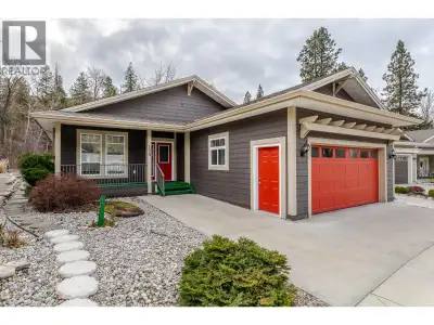 This is a MUST SEE beautifully crafted 1,800 sq. ft. EXECUTIVE RANCHER backing onto a peaceful, ramb...