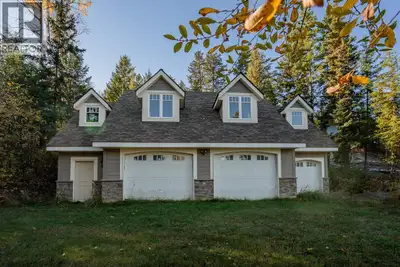This unique Canim Lake property feels like you're living in the best kind of tree house. You'll wake...
