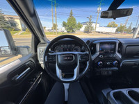 This vehicle is equipped with: 6.6L 8 Cylinder Gas Engine 4Wheel Drive Long Box Heated Steering Whee... (image 9)
