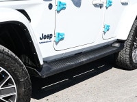 The 2024 Jeep Wrangler 4xe High Altitude 4 Door blends open-air freedom with plug-in hybrid power in... (image 5)