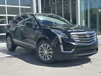 The 2019 Cadillac XT5 Luxury AWD, finished in black with a black leather interior, offers a refined... (image 8)