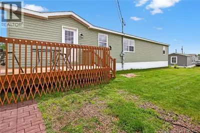 MOVE IN READY - Modern 3-Bedroom Mini Home in Sought-After Domaine du Ruisseau Welcome to this beaut...