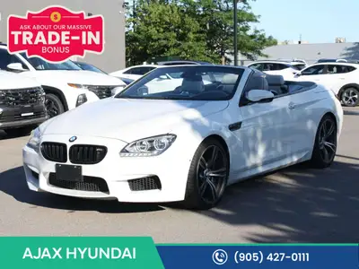 Experience exhilarating performance, open-air luxury, and unmistakable BMW M engineering with this 2...