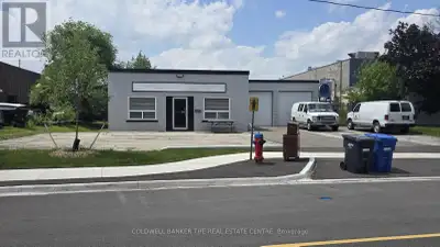 Freestanding AUTOMOTIVE use building for sale on Wallace Road in Oakville. The 0.30 acre site has be...