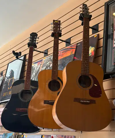 Variety of Acoustic Guitars: Epiphone, Yamaha, Seagull..., View more