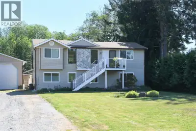 Little River Gem with Legal Suite, Detached Shop & Stunning Gardens! Welcome to one of the Comox Val...