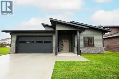 Welcome to your dream home - a stunning, brand new, rancher crafted with care by Swift River Constru...