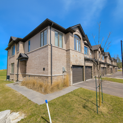 Lovely End-unit 2 storey Townhome! The main living area has been finished in hard wood and features...