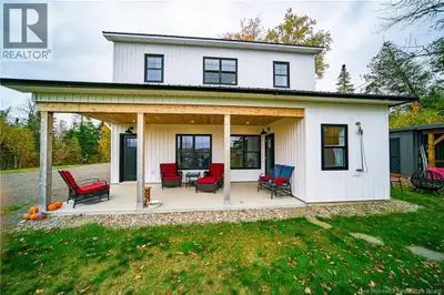 WATERFRONT HOME!! The waterfront house/garage was built to be very versatile such that the main leve...