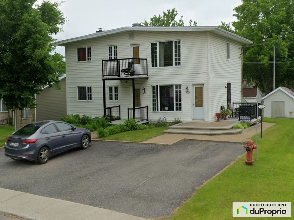 $549,000 - Triplex for sale in St-Redempteur — photo 1