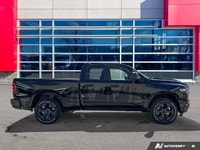 Odometer is 12404 kilometers below market average! Diamond Black Crystal Pearlcoat 2025 Ram 1500 Tra... (image 6)