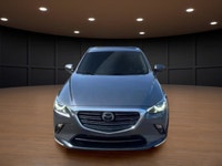Get ready to conquer the roads with the 2022 Mazda CX-3 GT, a sophisticated gray SUV that combines a... (image 2)