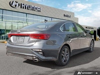 This 2021 Kia Forte EX offers a compelling blend of style and practicality. Boasting a sleek gray ex... (image 4)