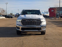 The 2026 Ram 1500 Longhorn Crew Cab in Ivory Tricoat Pearl combines rugged capability with refined l... (image 9)