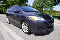 WOW!! Check out this Mazda5 GT that just arrived at our store. This beauty comes to us as a 1 Owner... (image 5)