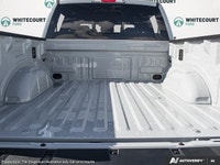 Introducing the 2026 Ford F-150 Tremor, dressed in a stunning white exterior and equipped with a rob... (image 7)