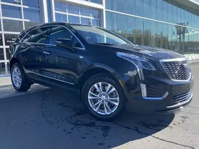 The 2024 Cadillac XT5 Standard AWD, finished in Stellar Black Metallic, combines refined styling, ad...