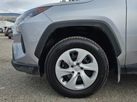 The 2024 Toyota RAV4 LE AWD in stunning Silver is the perfect SUV for those who appreciate comfort a... (image 4)