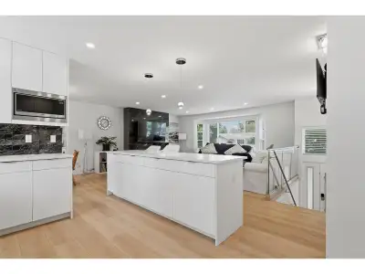 Stunningly renovated 5 bed, 3 bath home situated on a massive 11,541 SOFT lot in a quiet family-frie...