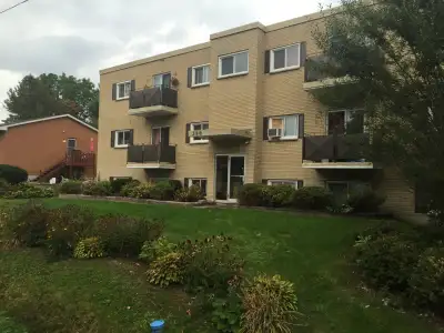 Beautiful 3 storey apartment building located in quiet residential zone, 1 bedroom available Close t...