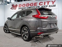 The 2018 Honda CR-V Touring AWD delivers premium comfort, advanced safety, and confident all-weather... (image 3)