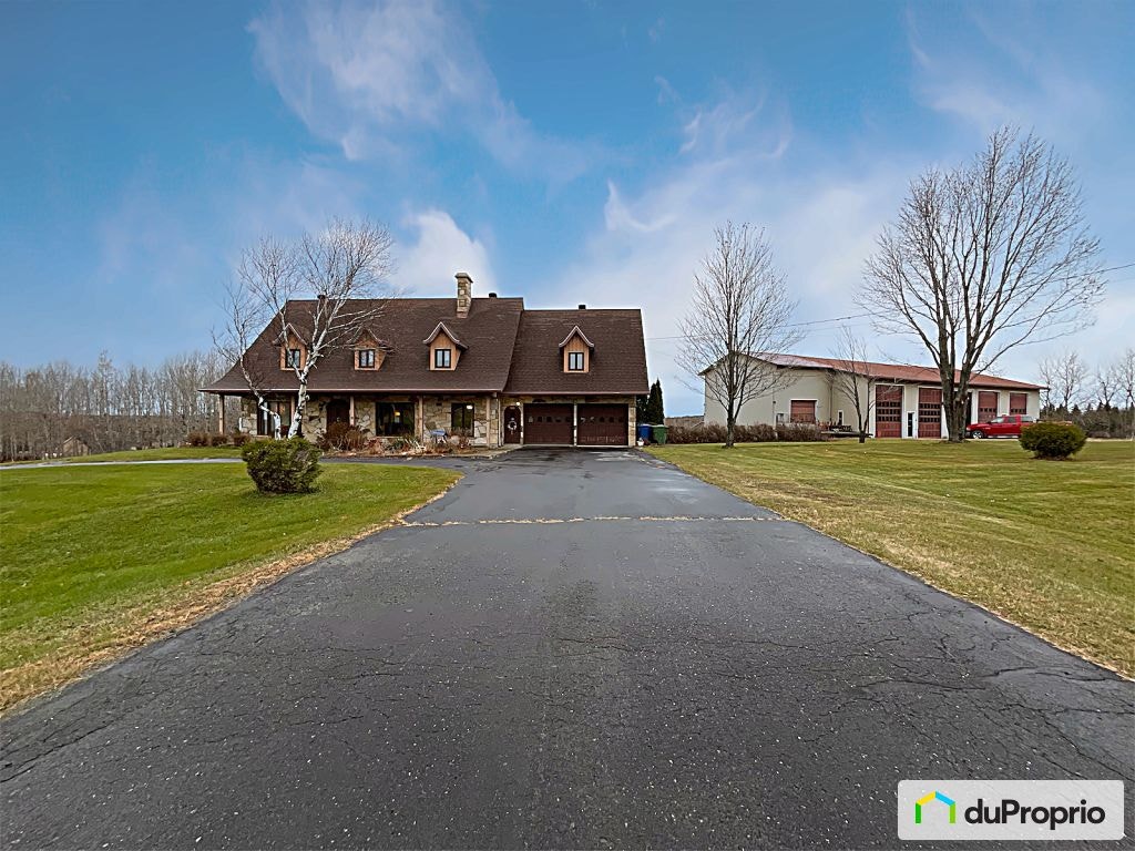 $675,000 - 2 Storey for sale in Frontenac — photo 1