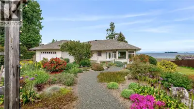 Visit REALTOR website for additional information. Step into West Coast living with this stunning wal...