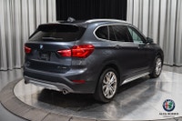 WAS: $26995 NOW: $23995 plus taxes and licensing feesThe 2018 BMW X1 xDrive28i combines luxury, perf... (image 4)