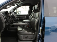 This 2021 Ram 3500 Laramie is finished in Patriot Blue Pearl with the blacked-out Night Edition pack... (image 2)