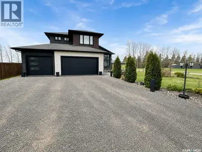 Welcome to this stunning 1,864 sq ft modified bi-level built in 2017, located in the welcoming commu...