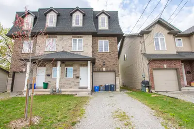 ROOMS FOR RENT!! This house has 5 bedrooms total (3 upper rooms ), 3 bathrooms, large closets, kitch...