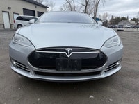 Experience the exceptional performance of the 2015 Tesla Model S P85D, a stunning silver AWD sedan r... (image 7)