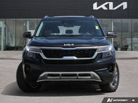 Navigate Canadian roads with confidence and style in this stunning Black 2023 Kia Seltos EX Sport Ut... (image 1)