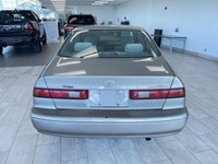 The 1998 Toyota Camry is a fuel-efficient midsize sedan known for its long-lasting durability, smoot... (image 3)