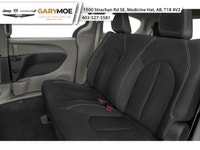 The 2026 Chrysler Grand Caravan SXT in a captivating black hue is the front-wheel drive van designed... (image 9)