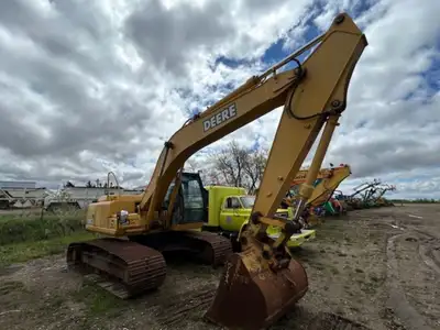 2003 DEERE 200C LC CAB, HEAT, AIR, AIR IRDE, 58" CLEAN OUT BUCKET & THUMB ONLY 8278 HOURS! FOR THE B...