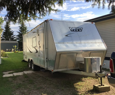 All aluminum toy hauler. GVWR: 8000lb. Ramp door 76 3/4" tall/96" wide. Toy bay 18'. 6 x 5000 lb rec...