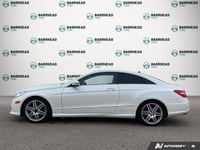 Step into elegance with this 2011 Mercedes-Benz E-Class E 550 Coupe, showcasing a crisp White exteri... (image 2)