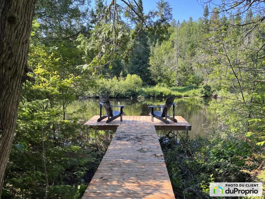 $735,000 - Raised Bungalow in Ste-Marguerite-Du-Lac-Masson — photo 1