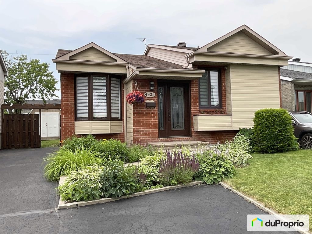 $632,000 - Bungalow for sale in Longueuil (St-Hubert) — photo 1