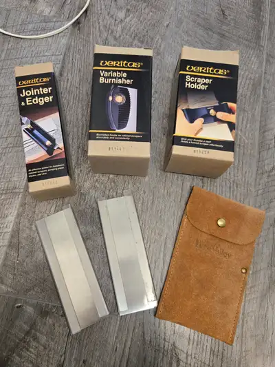 Veritas scraper set. Includes scraper, jointer/edger, and burnisher. Like new.....all with original...