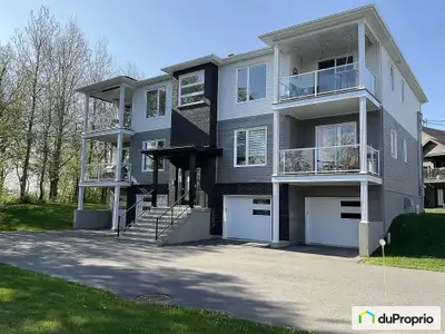 Condo 4 1/2 à vendre - Ce condo lumineux, à l'état neuf et habité par une seule propriétaire, est pa...
